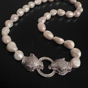 Fresh water pearl necklace with Jaguar clasps